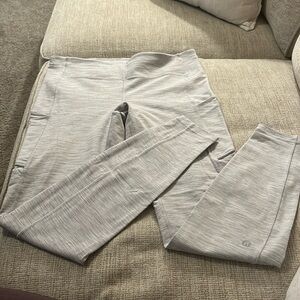Lululemon size 8 ladies leggings with pockets and back zipper hardly worn